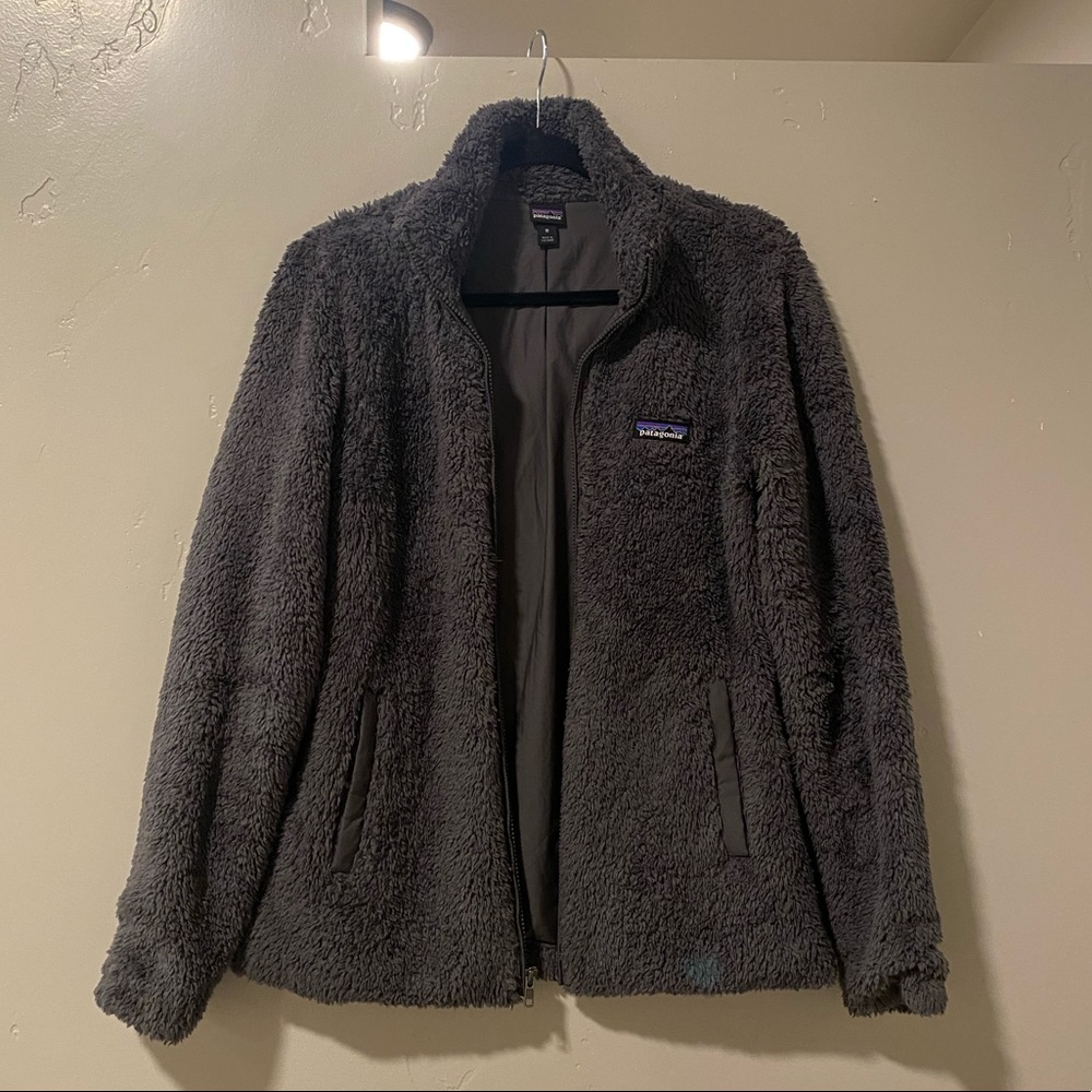 Charcoal grey fleece Patagonia jacket.